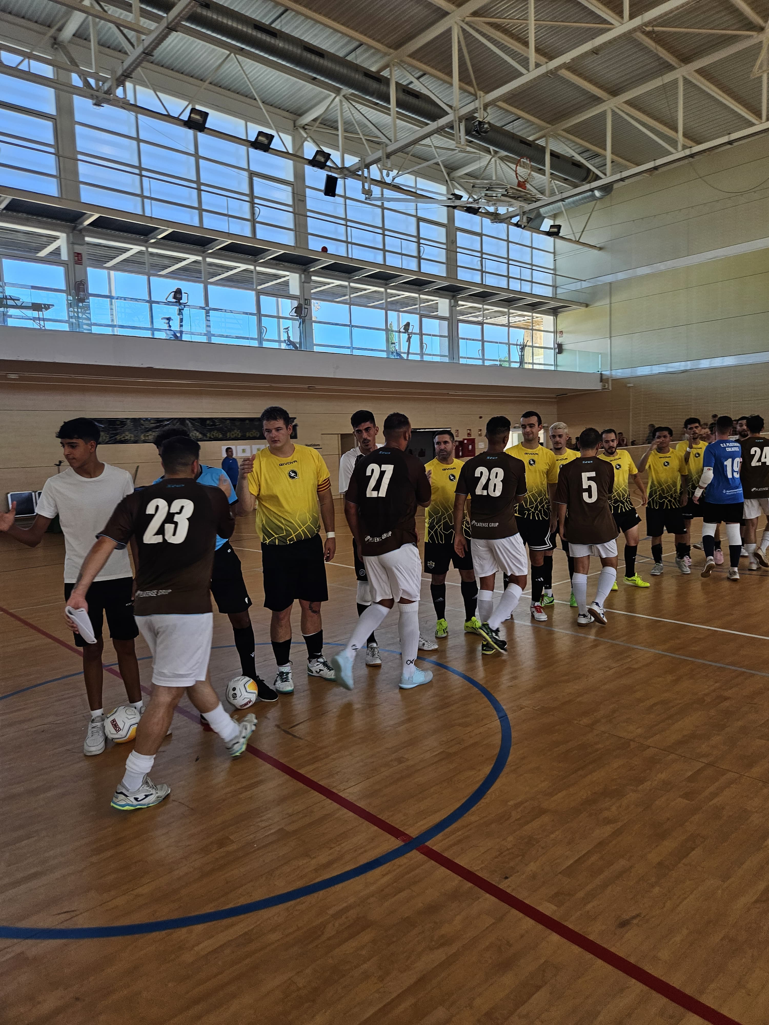futsal players shaking hands